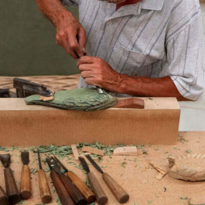 Sculpting of Flahy Bar Stool's wings by hand.