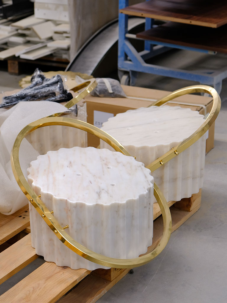 Flahy Bar Stool base featuring marble and polished brass.
