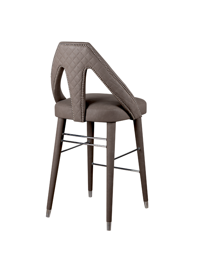 Caron Bar Chair upholstered in gray fabric, with polished stainless steel details and silver studs.