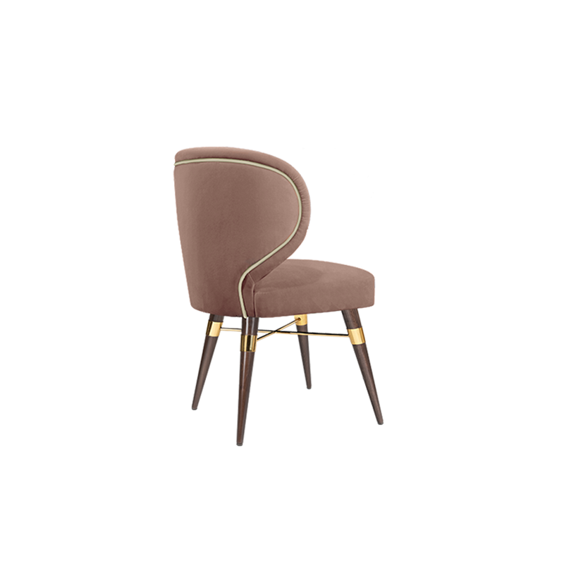 Louis dining chair upholstered in warm taupe fabric, accented with piping, supported by smoked walnut legs, and enhanced with polished brass details.