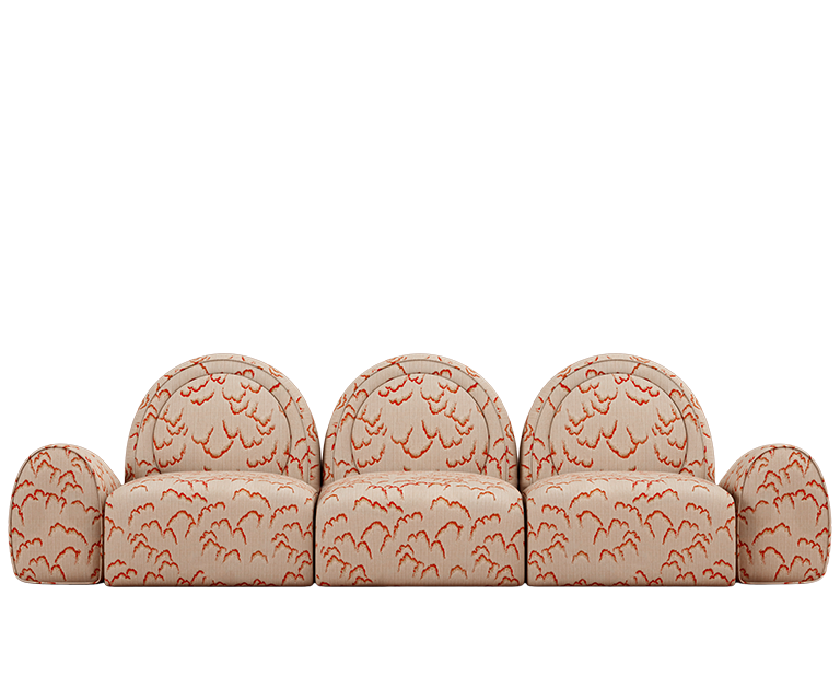 Simone sofa upholstered in Dedar fabric with orange detailing.