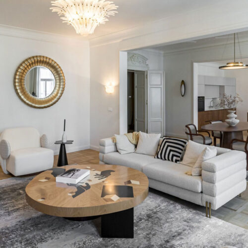 Zborovská Apartment living room featuring La voix armchair, In vij en center table and JAmes dining chair