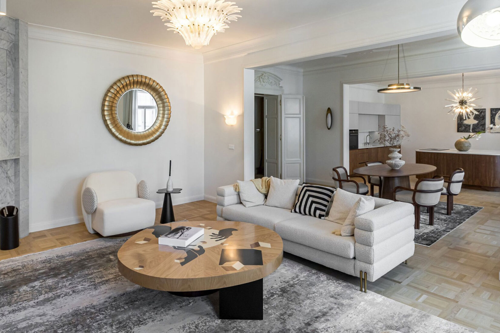 Zborovská Apartment living room featuring La voix armchair, In vij en center table and JAmes dining chair