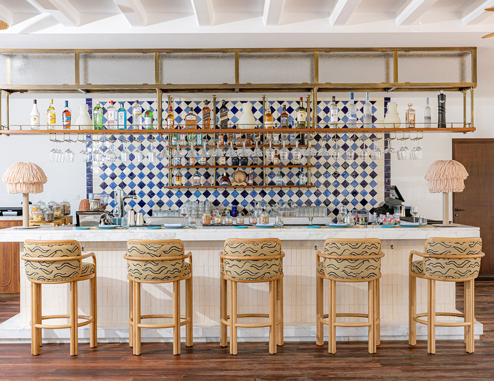 Five James Bar Chairs with oak structures and patterned fabric upholstery at Blu Restaurant in the Tunis Four Seasons Hotel.