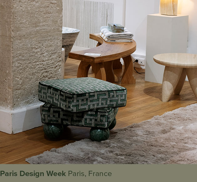 Madonna stool upholstered in green patterned fabric with Verde Guatemala marble sphere feet, displayed at Paris Design Week in France.