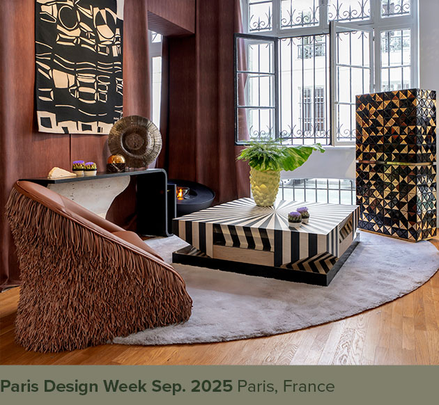 Op-Art center table showcased at Paris Design Week, featuring black and white marquetry work.
